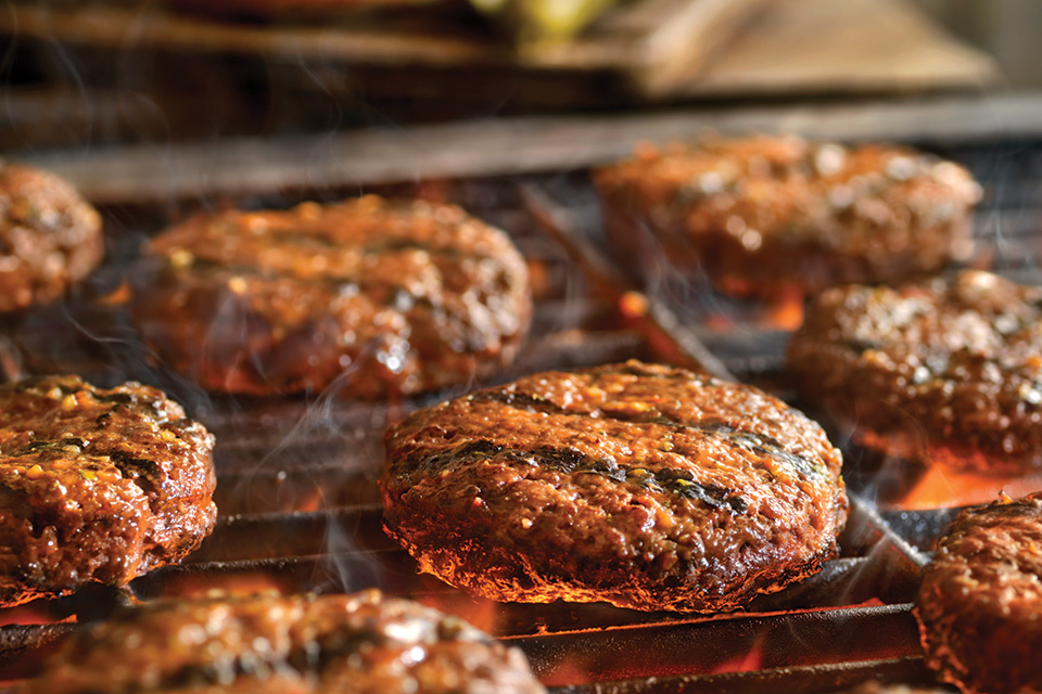 Hamburgers cooking on the grill (photo by Istock) Hamburgers cooking on the grill (photo by Istock)